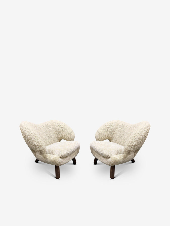 Pair Of Finn Juhl Pelican Chair in Moonlight Sheepskin