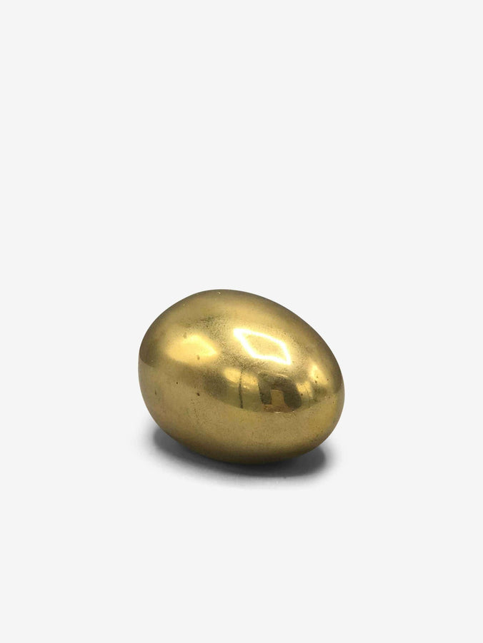 Egg Paperweight in Brass by Carl Aubock